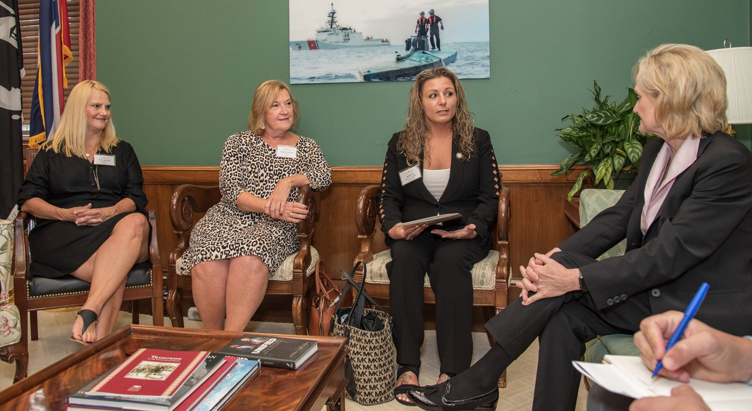 Senator Hyde-Smith visits with Jessica Fly of Grenada and representatives of the National Hardwood Lumber Association