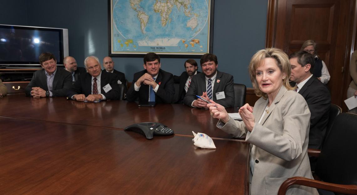 Senator Hyde-Smith meets with farmers attending the USA Rice Government Affairs Conference