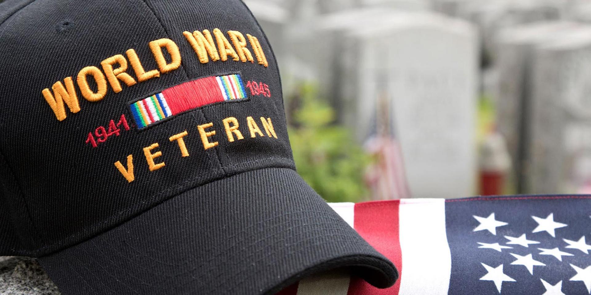 Photo of World War II Veteran hat and American flag