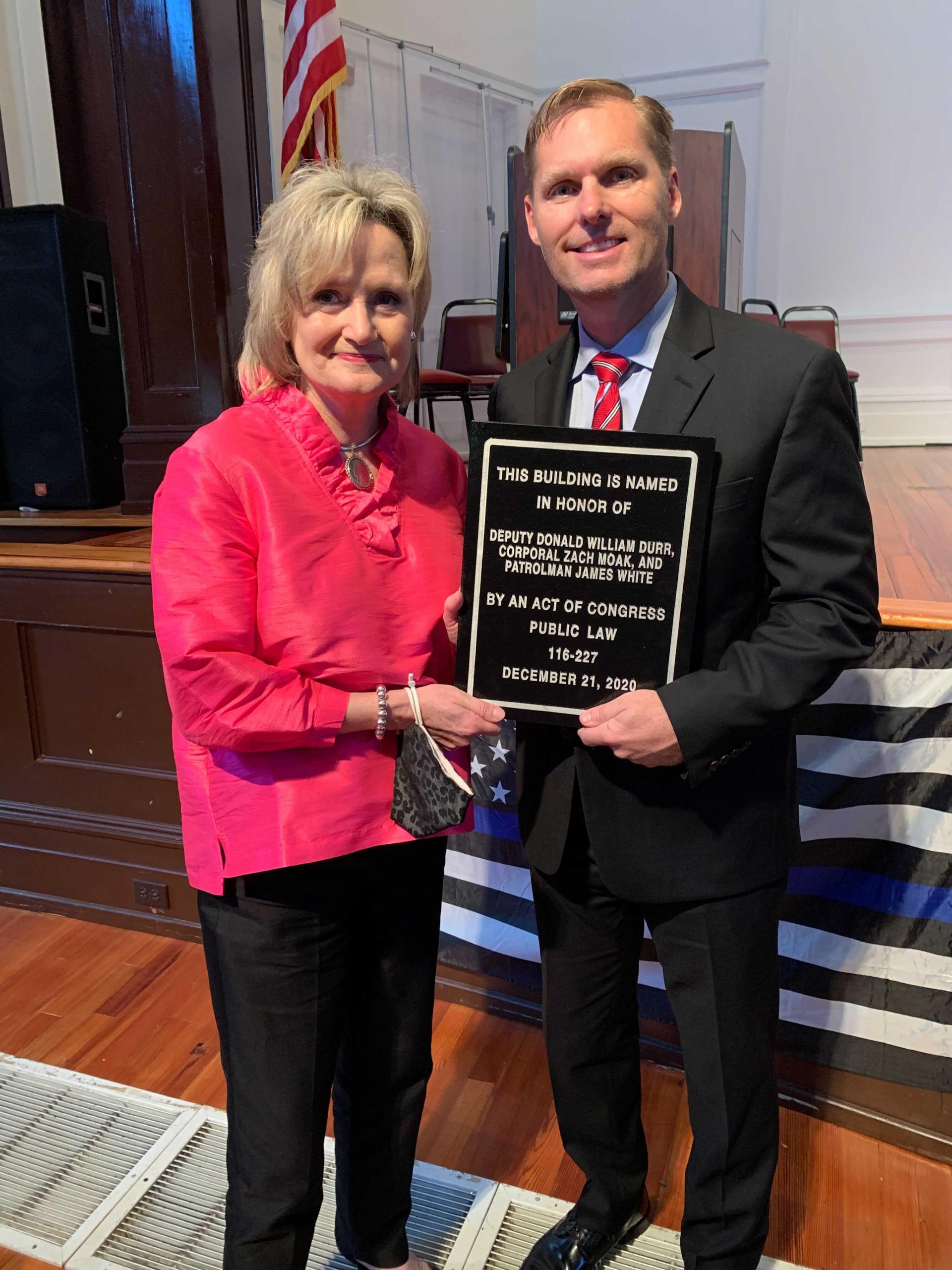 Senator Hyde-Smith and Representative Michael Guest (R-Miss.) attend a ceremony naming the Brookhaven post office in memory of fallen officers Deputy Donald Durr, Corporal Zach Moak, and Patrolman James White. (May 3, 2021)