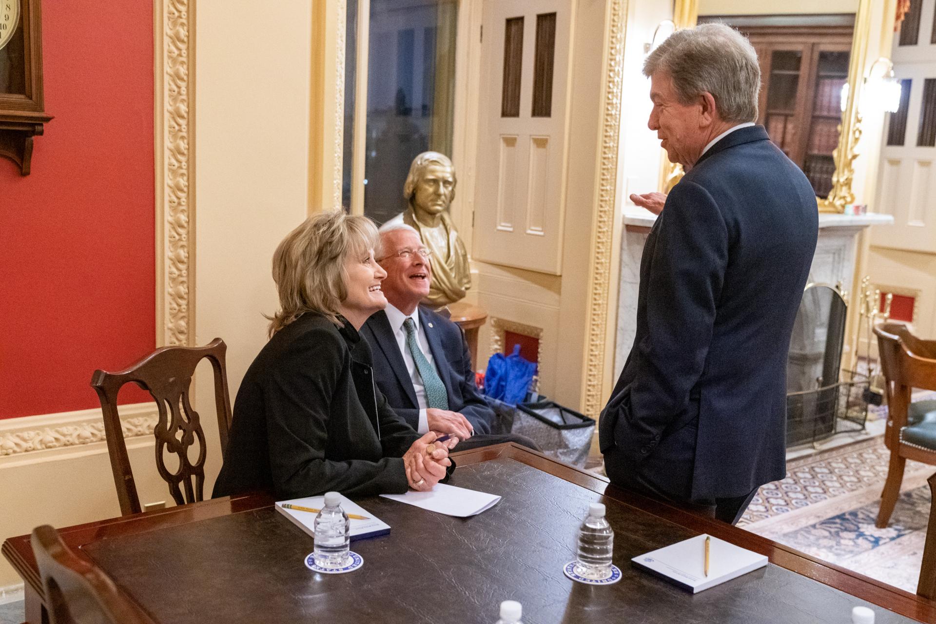 Senator Hyde-Smith and Senator Wicker visit with Senator Roy Blunt (R-Mo.) during a year-end Senate session at the Capitol. (Dec. 16, 2019)